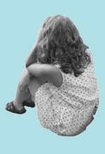 Girl seated alone.